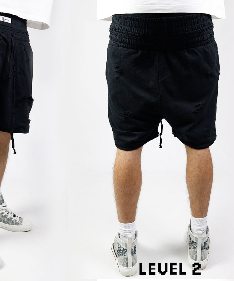 Black distressed shorts